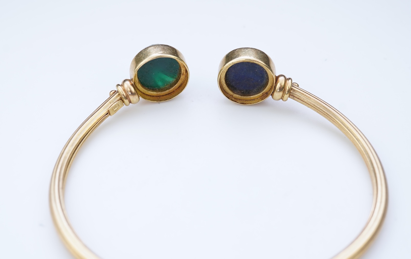 A gold, lapis lazuli and green chalcedony bangle